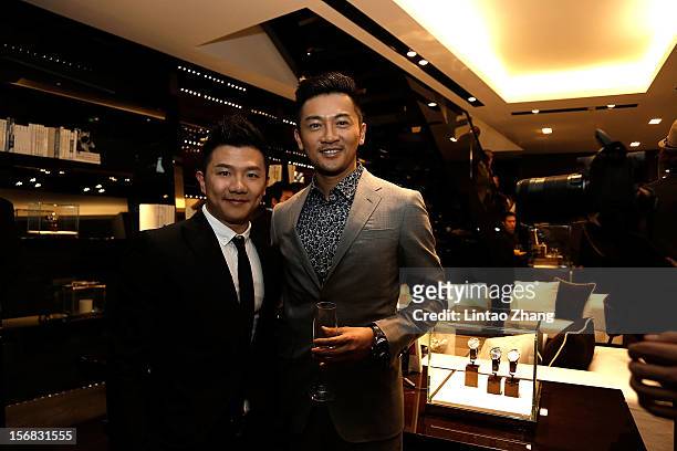 Actor Alec Su and Olympic gold medalist Chen Yibing pose for photographs during the IWC Flagship Boutique Opening on November 22, 2012 in Beijing,...