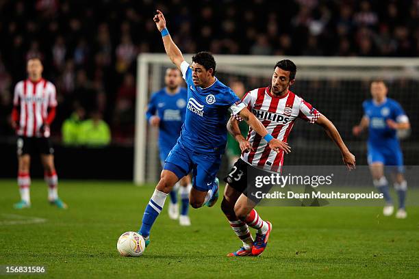 Stanislav Manolev of PSV and Victor Giuliano of Dnipro battle for the ball during the UEFA Europa League Group F match between PSV Eindhoven and FC...