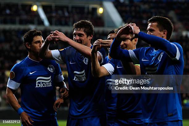 Yevhen Seleznyov of Dnipro celebrates scoring his teams first goal of the game with team mates during the UEFA Europa League Group F match between...