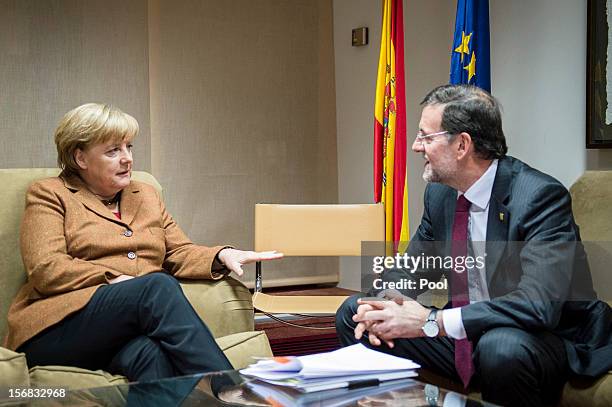 In this photo provided by the German Government Press Office , German Chancellor Angela Merklel holds talks with Spanish Prime Minister Mariano...