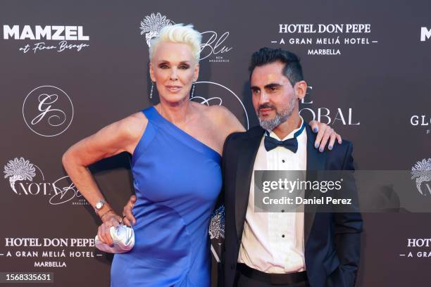 Brigitte Nielsen and Mattia Dessi attend the Global Gift Gala Red Carpet at Hotel Don Pepe on July 24, 2023 in Marbella, Spain.