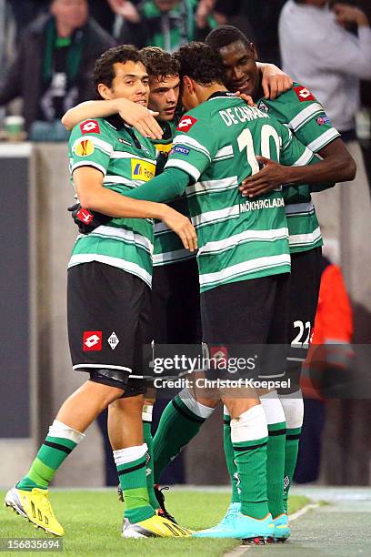 Igor de Camargo of Moenchengladbach celebrates the second goal with Juan Arango , Granit Xhaka and Peniel Mlapa of Moenchengladbach during the UEFA...