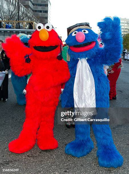 Sesame Street's Elmo and Grover attend the 93rd annual Dunkin' Donuts Thanksgiving Day Parade on November 22, 2012 in Philadelphia, Pennsylvania.