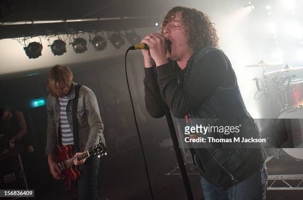 Oliver Main and Matt Bowman of Pigeon Detectives perform onstage at Newcastle University on November 22, 2012 in Newcastle upon Tyne, England.