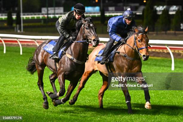 Mark Zahra riding Gold Trip against Ethan Brown riding Sir Davy during track gallops at Moonee Valley Racecourse on July 25, 2023 in Melbourne,...