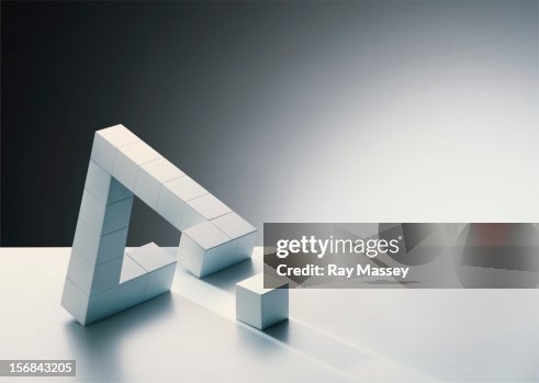 Missing cube in triangle formation Missing cube in triangle formation