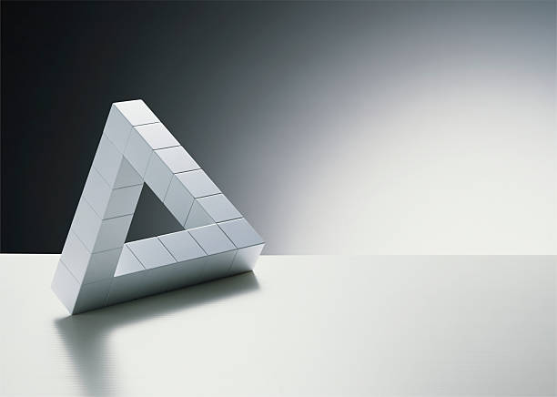 cubes forming triangle - triangle stock pictures, royalty-free photos & images