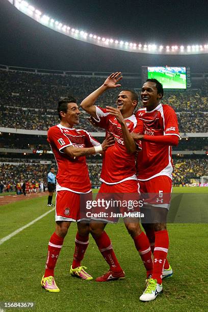 Lucas Silva of Toluca celebrates with teammates a scored goal during a match against America as part of the semifinal Apertura 2012 Liga MX at Azteca...