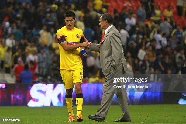 Jesus Molina of America and Coach Enrique Meza of Toluca during a semifinal match between America and Toluca as part of the Apertura 2012 Liga MX at...