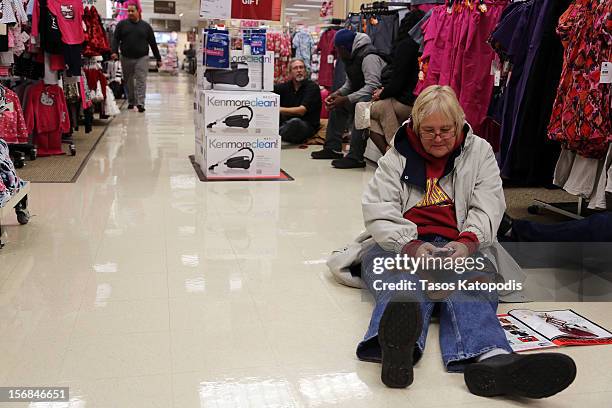 Shoppers came out early at Sears for the 4am doorbuster deals on Thanksgiving night November 22, 2012 in Highland, Indiana. Many stores got a head...