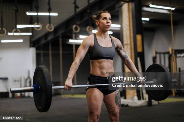 getting stronger - body builders stock pictures, royalty-free photos & images