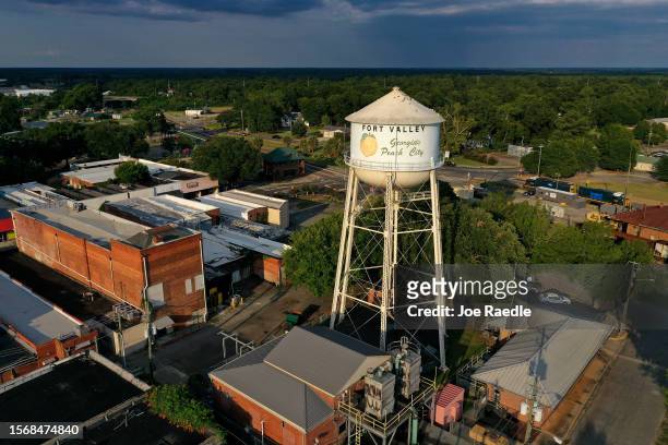 Georgia's Peach City" is written on the water tower above the town on July 24, 2023 in Fort Valley, Georgia. Peach farmers in Georgia say that a heat...