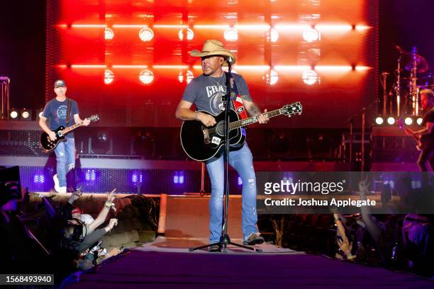Jason Aldean performs onstage at Country Thunder Wisconsin - Day 3 on July 22, 2023 in Twin Lakes, Wisconsin.