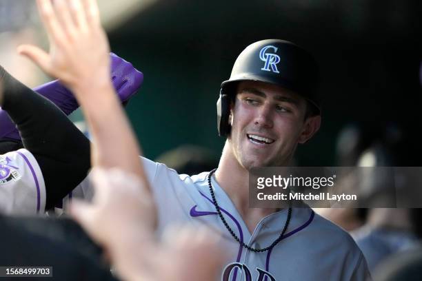 Nolan Jones of the Colorado Rockies celebrates hittiing a two run home run in the sixth inning during a baseball game against the Washington...