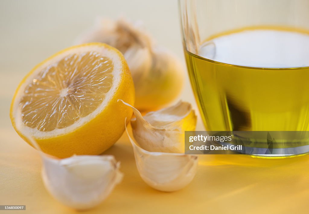 Lemon, garlic and jar of honey