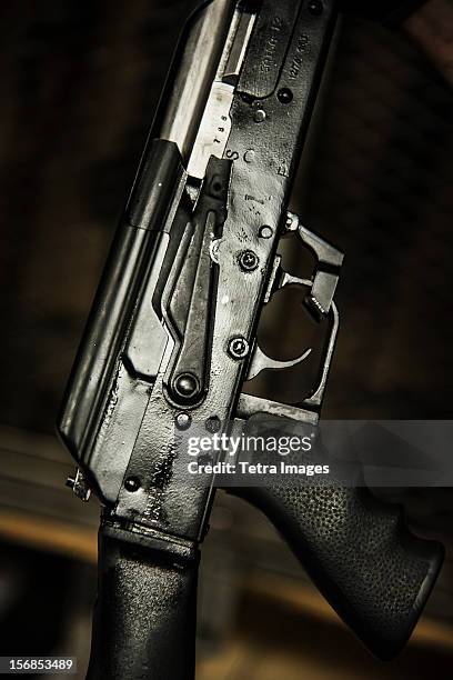 studio shot of gun - ak-47 - kalashnikov stock-fotos und bilder