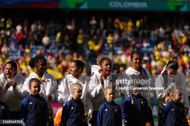 Colombia players show emotions as they sing the national anthem prior to the FIFA Women's World Cup Australia & New Zealand 2023 Group H match...