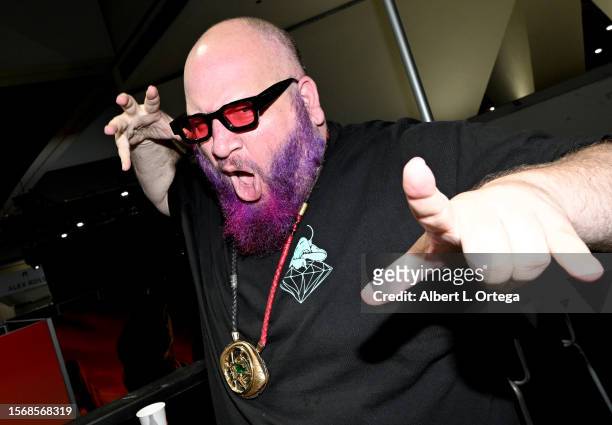 Stephen Kramer Glickman wears the 'Eye Of Agamotto' featured in Marvel's "Doctor Strange" made by East Continental Gems at the 2023 Comic-Con...