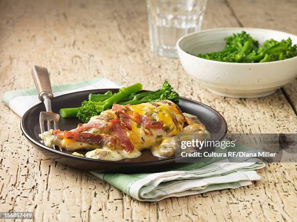 chicken with cheese and broccoli - chicken meat stock pictures, royalty-free photos & images