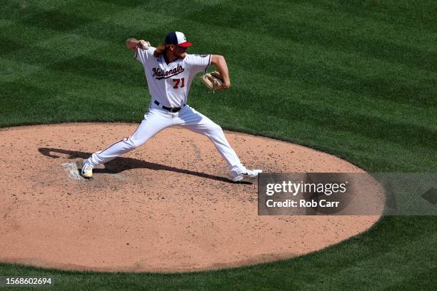 Mason Thompson of the Washington Nationals pitches against the San Francisco Giants at Nationals Park on July 23, 2023 in Washington, DC.