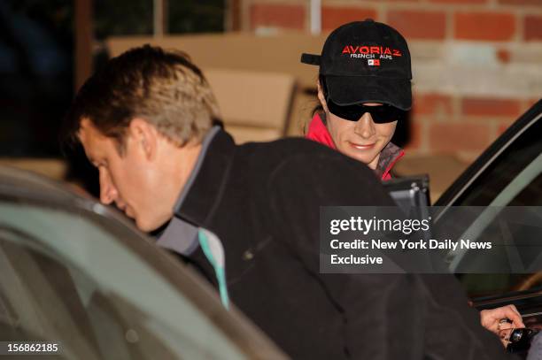 Paula Broadwell and her husband, Scott, prepare to drop off their two children at school on Monday, November 19, 2012 in Charlotte, North Carolina.