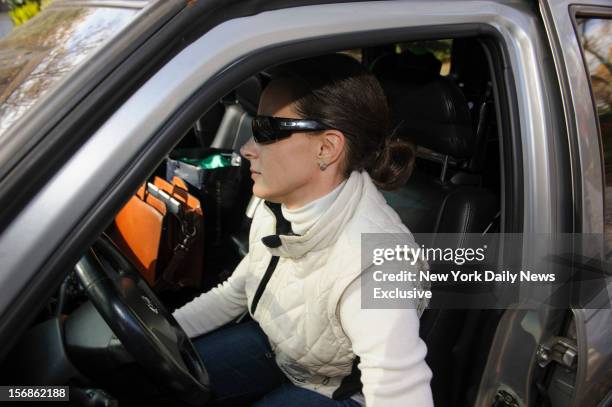 Paula Broadwell leaves her home on Monday, November 19, 2012 in Charlotte, North Carolina.