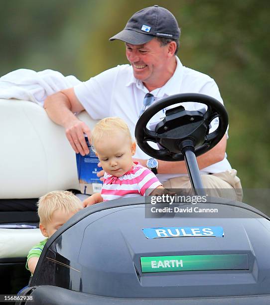 Gary Tait the European tour referee enjoys some company whilst on duty during the second round of the 2012 DP World Tour Championship on the Earth...