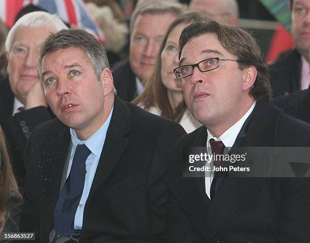 Manager Sir Alex Ferguson's sons Darren Ferguson and Jason Ferguson attend the unveiling of a statue of Manager Sir Alex Ferguson of Manchester...