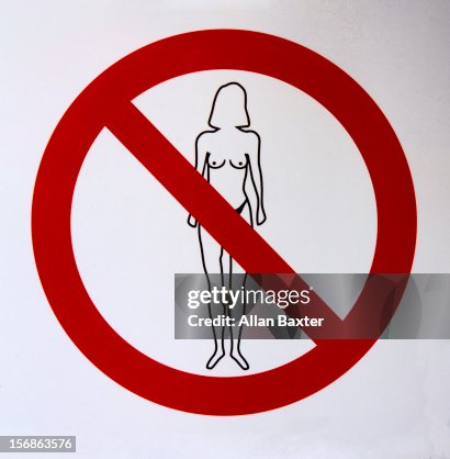 A 'no topless sunbathing' sign A 'no topless sunbathing' sign