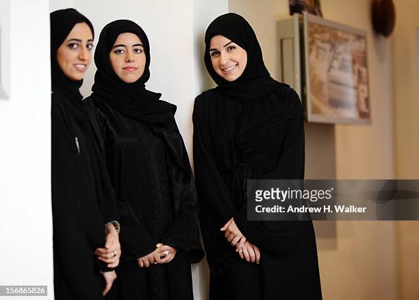 Filmmakers Sara Al-Saadi, Latifa Al-Darwish and Maaria Assami pose for a portrait during the 2012 Doha Tribeca Film Festival at AL Najada Hotel on...