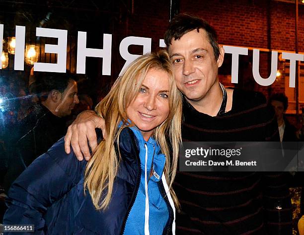 Meg Mathews and Jamie Hince attend the launch of the Stutterheim Raincoats pop up shop in Shoreditch on November 22, 2012 in London, England.