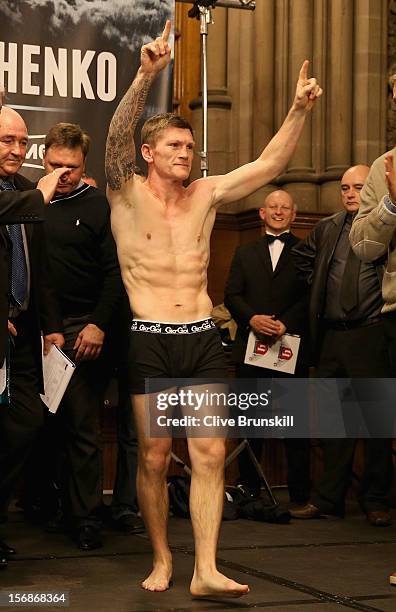 Boxer Ricky Hatton salutes his fans as he walks on stage to weigh in prior to his bout with Vyacheslav Senchenko at at the Manchester Town Hall on...