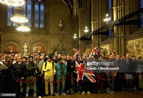 Fans of boxer Ricky Hatton give their support during his weigh in prior to his bout with Vyacheslav Senchenko at at the Manchester Town Hall on...