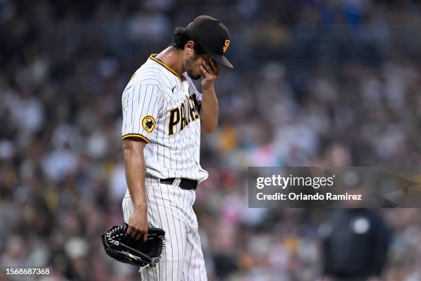 Yu Darvish of the San Diego Padres wipes his face after a two-run home run by Carlos Santana of the Pittsburgh Pirates during the fifth inning at...