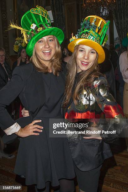 Young employees of the Jean-Paul Gaultier fashion house pose at the Paris City Hall during the Sainte-Catherine Celebration on November 23, 2012 in...