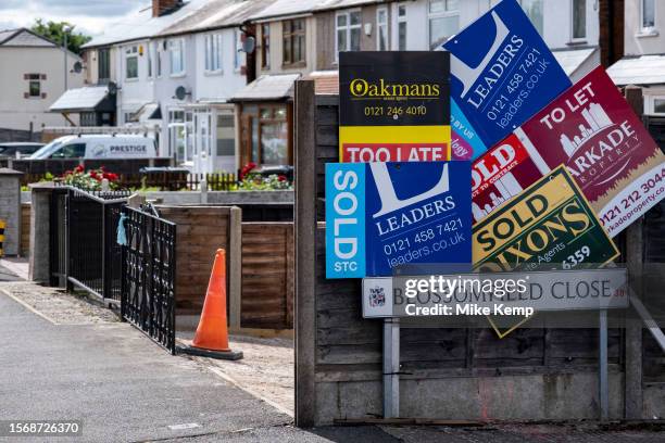 Various estate agents for sale and sold signs in the Hawkesley area near Kings Norton area on 3rd July 2023 in Birmingham, United Kingdom. Housing in...