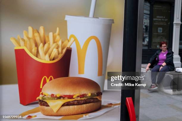 McDonalds double cheeseburger saver meal deal menu beef burger advertising poster on 6th July 2023 in London, United Kingdom.