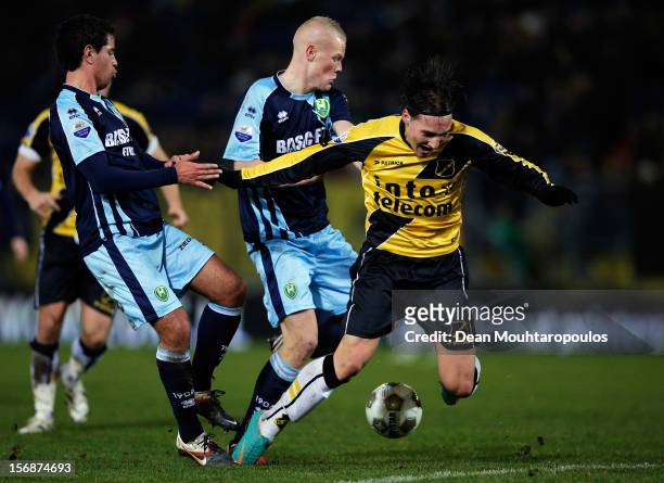 Nemanja Gudelj of NAC and Tom Beugelsdijk of Den Haag battle for the ball during the Eredivisie match between NAC Breda and ADO Den Haag at the Rat...