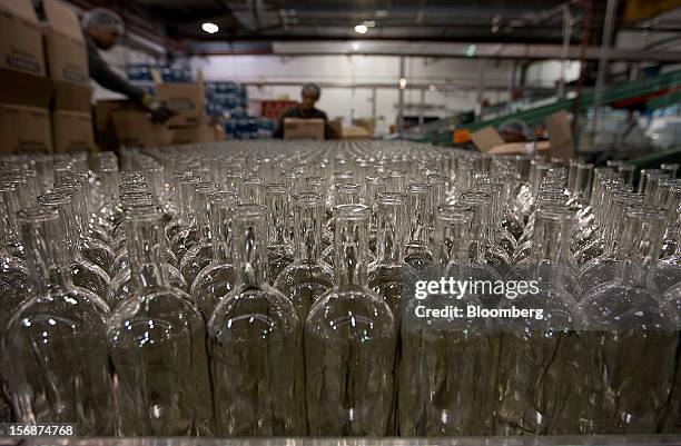 Empty bottles to be used for Jose Cuervo Tradicional tequila wait to be filled at the Tequila Cuervo La Rojena S.A. De C.V. Bottling factory in...