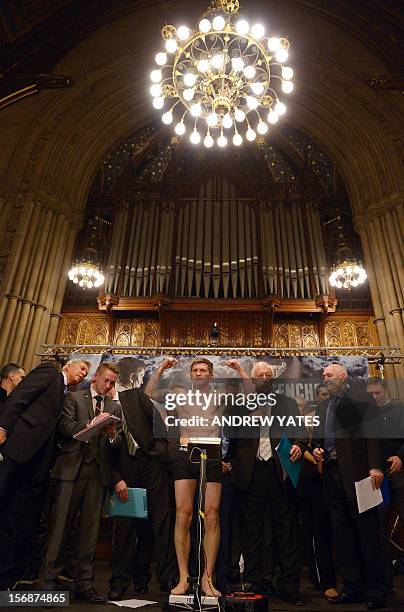 British boxer Ricky Hatton weighs-in at the Town Hall in Manchester, north-west England, on November 23 on the eve of his fight against Vyacheslav...