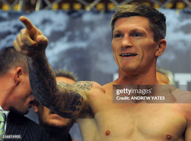 British boxer Ricky Hatton gestures during his weigh-in at the Town Hall in Manchester, north-west England, on November 23 on the eve of his fight...