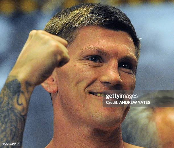 British boxer Ricky Hatton reacts during his weigh-in at the Town Hall in Manchester, north-west England, on November 23 on the eve of his fight...