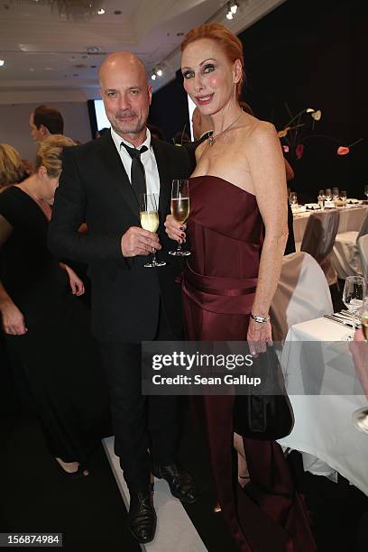 Actor Christian Berkel and actress Andrea Sawatzki attend the 2012 Bundespresseball at the Intercontinental Hotel on November 23, 2012 in Berlin,...