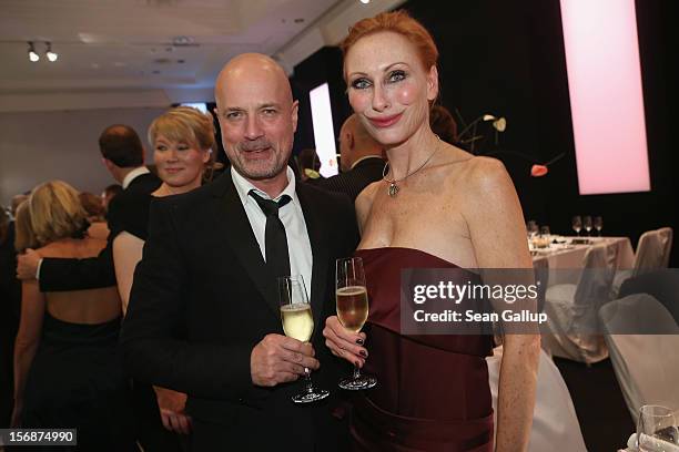 Actor Christian Berkel and actress Andrea Sawatzki attend the 2012 Bundespresseball at the Intercontinental Hotel on November 23, 2012 in Berlin,...