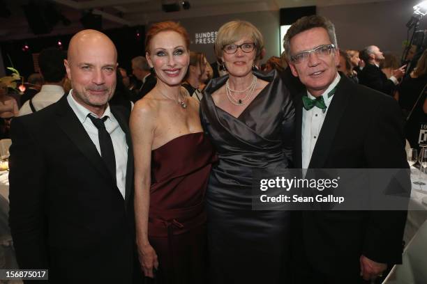 Actor Christian Berkel, actress Andrea Sawatzki, Martina de Maiziere and German Defense Minister Thomas de Maiziere attend the 2012 Bundespresseball...