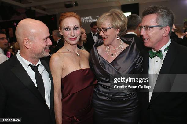 Actor Christian Berkel, actress Andrea Sawatzki, Martina de Maiziere and German Defense Minister Thomas de Maiziere attend the 2012 Bundespresseball...