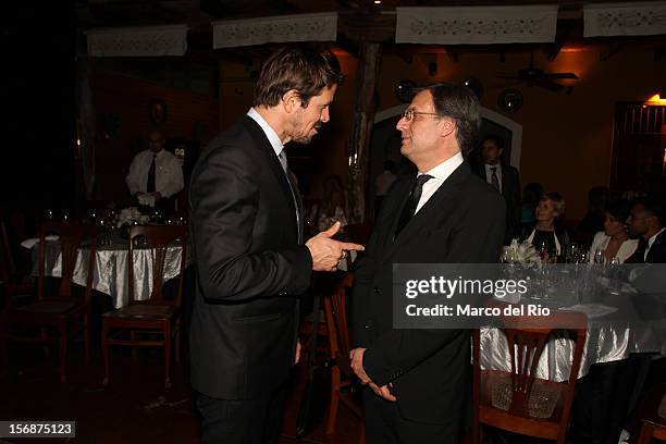 Cheff Rafael Osterling and GQ Director Rafael Molano talk during the awards ceremony GQ Men of the Year 2012 at La Huaca Pucllana on November 23,...