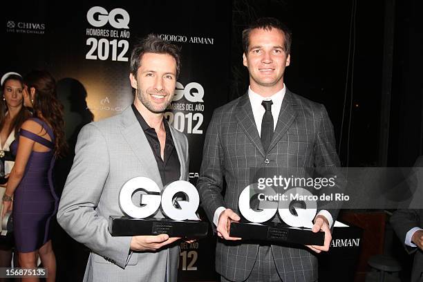 Actor Marco Zunino and Pilot Nicolas Fuchs pose during the awards ceremony GQ Men of the Year 2012 at La Huaca Pucllana on November 23, 2012 in Lima,...