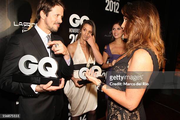 Rafael Osterling, Vania Masias, Anahi Gonzales and Jessica Newton talk during the awards ceremony GQ Men of the Year 2012 at La Huaca Pucllana on...