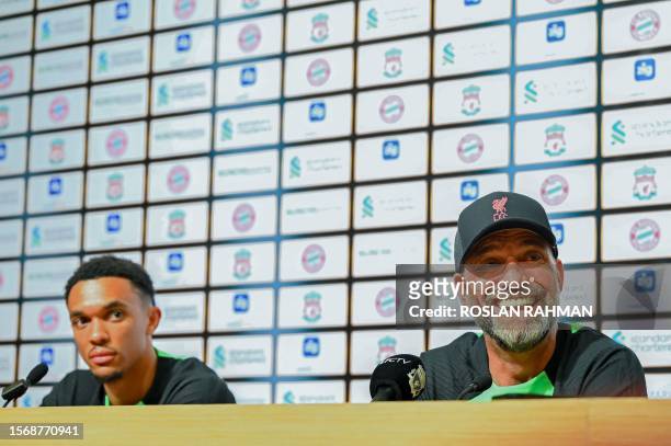 Liverpool FC team manager Jurgen Klopp and team captain Trent Alexander-Arnold attend a press conference at the Singapore Festival of Football in...